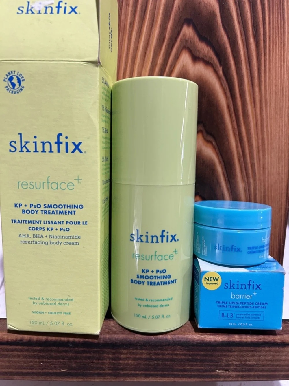 Skinfix resurface+ and barrier+ moisturizer duo in light green & bright blue